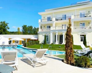 Юни в Огняново! Нощувка на човек със закуска и вечеря + външен и вътрешен басейн с минерална вода и релакс зона от хотел Алексион Палас, Огняново